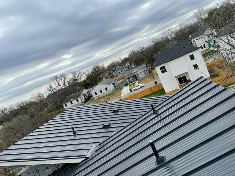 Standing seam metal roof panels with vents for Skylight Repair in Fallsburg